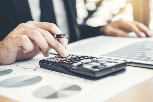 Financial Business man Accounting Calculating Cost Economic budget investment and saving concept Financial Business man Accounting Calculating Cost Economic budget investment and saving concept