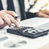 Financial Business man Accounting Calculating Cost Economic budget investment and saving concept