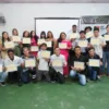 Turma de alunos do IES celebra formação em curso de capacitação interno realizado em 2024, antes da parceria com o JPMorganChase